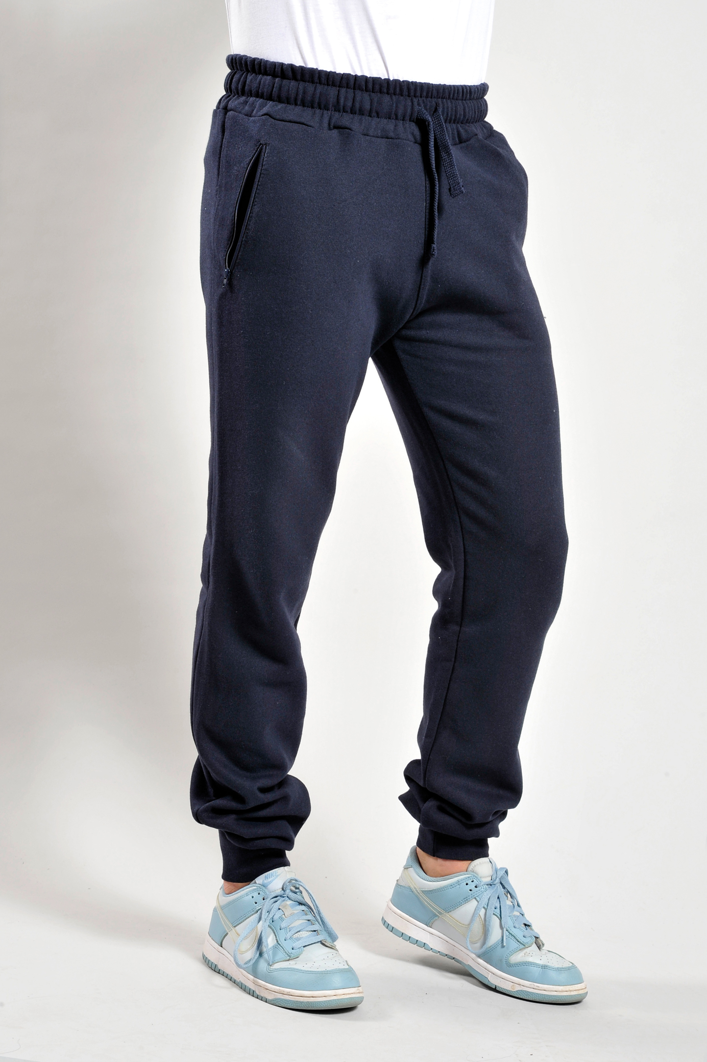 Pantalon en polaire avec ourlet côtelé et poches zippées